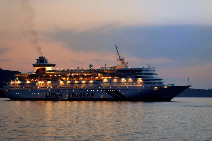 Cruise ship Louis Cruises departing in front of Fira, island Santorin, the Aegean Sea, the Cyclades, Aegean islands, Greece