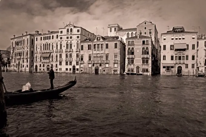 Italy, Venice, Grand Canal, gondolier, row of houses