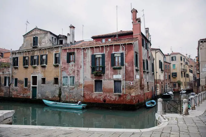 Old house row at canal, Venice, Veneto, Italy