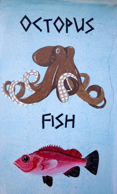 octopus and fish painted on a house wall in Greece