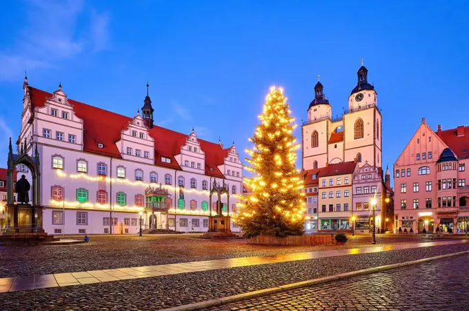 Market square with Christmas tree, town hall and St. Marien town church in Luherstadt Wittenberg, Saxony-Anhalt, Germany