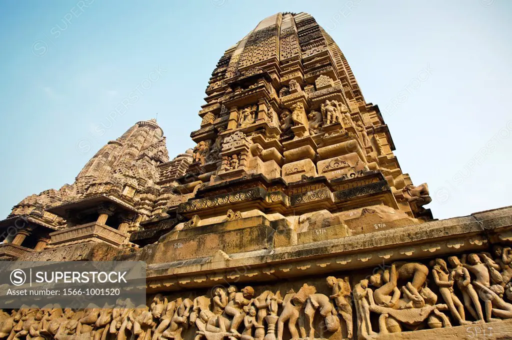 Erotic sculptures on Lakshmana Temple dedicated to Vishnu is built by chandella ruler Vasovarman Between 930-950 AD , Khajuraho, Madhya Pradesh, India...