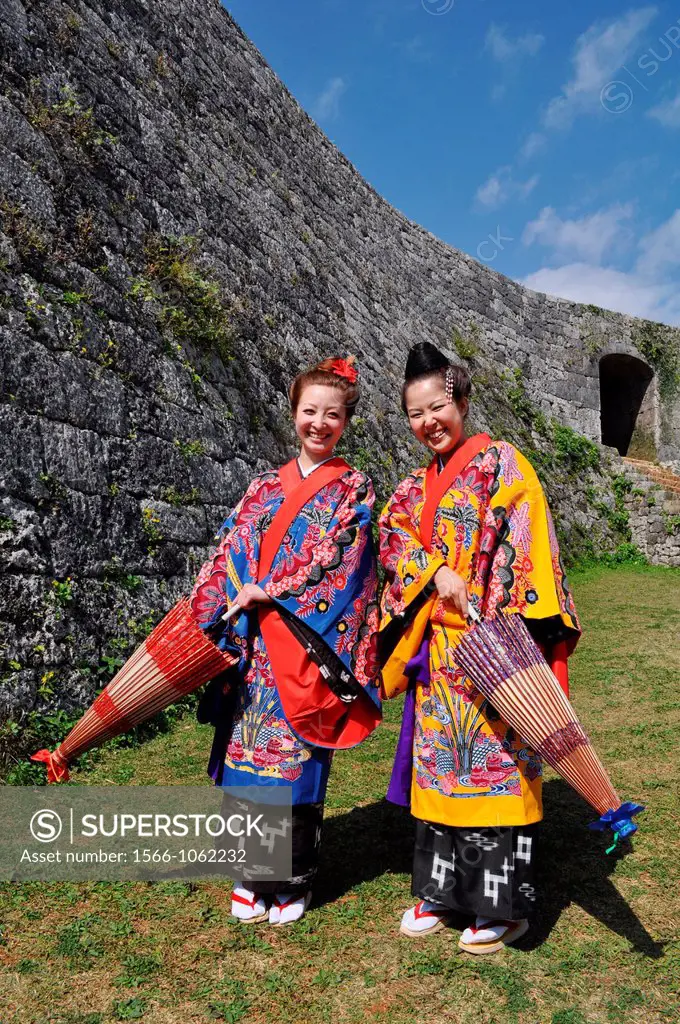 Yomitan, Okinawa, Japan: young women in traditional Okinawan outfit at Zakimi Castle  