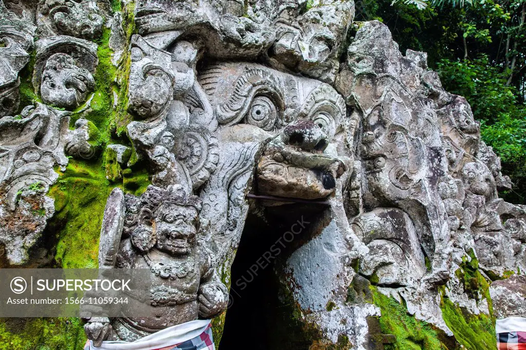 Indonesia, Bali, Goa Gajah the Elephant Cave, the menacing entrance to the cave looks like a demonic mouth and might depict the Hindu earth god Bhoma ...