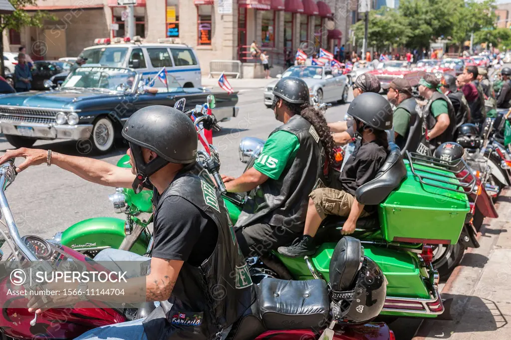 The Dirty Ones motorcycle club prepares to ride in the Brooklyn Puerto Rican Day Parade in the Bushwick neighborhood of Brooklyn in New York