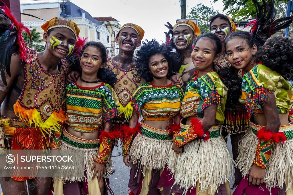 Tribal Dancers Pose For A Photo At The Dinagyang Festival, Iloilo City, Panay Island, The Philippines.