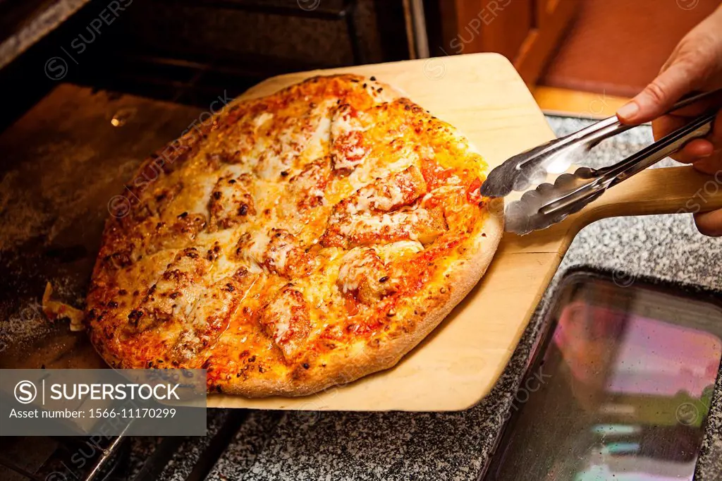 chicken parmesan pizza preparation.