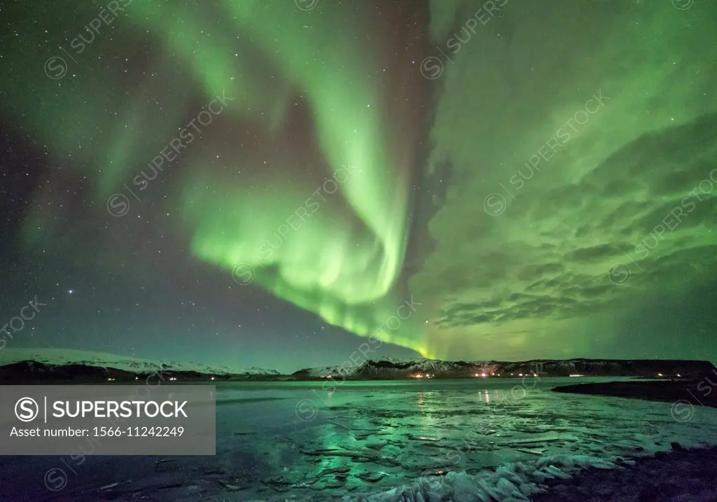 Aurora Borealis or northern Lights during winter at southern Iceland.