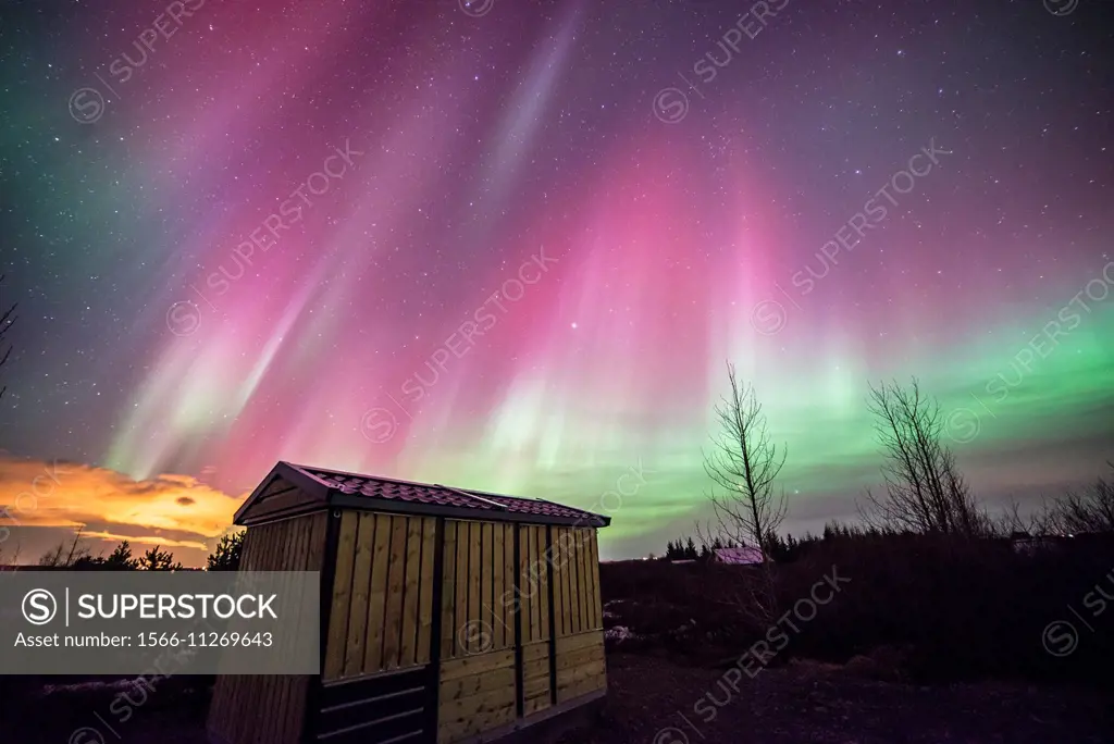 Winter Icelandic landscape with Northern lights background. Laugarvatn. Golden Circle. Iceland.