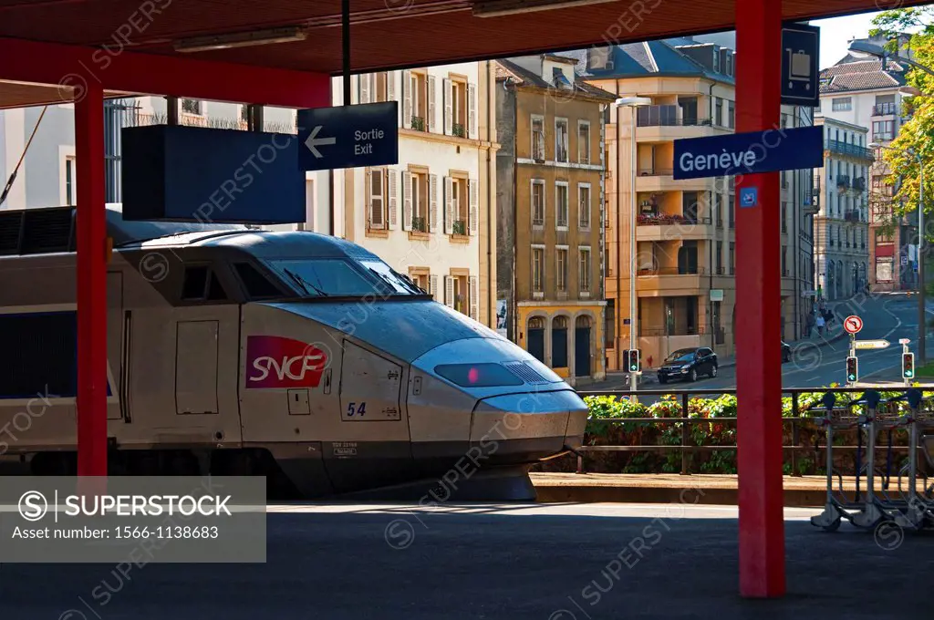 TGV fast train in Geneva main railway station - Cornavin, buildings of Geneva town in the background, Switzerland, Europe