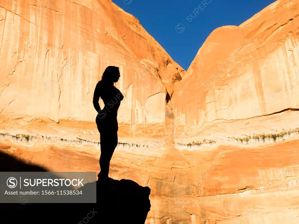 Portrait of nude woman. Lake Powell - SuperStock