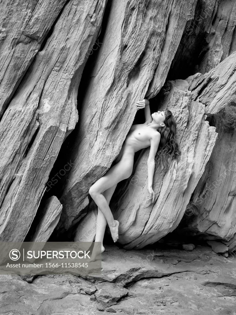 Portrait of nude woman. Lake Powell - SuperStock