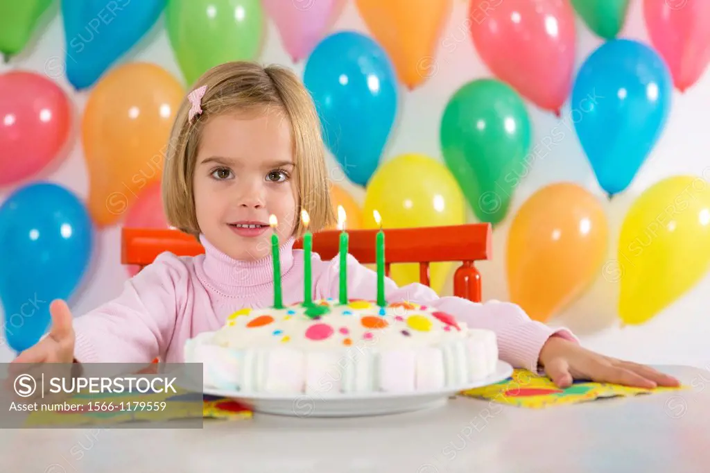 Four year old girl celebrating her birthday