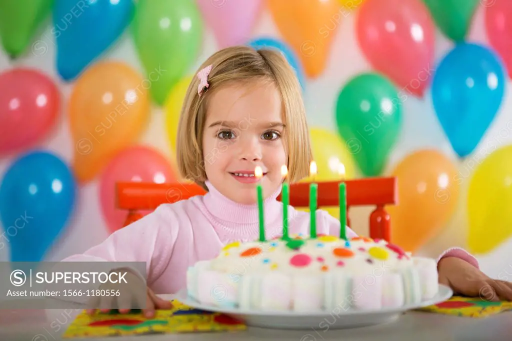 Four year old girl celebrating her birthday