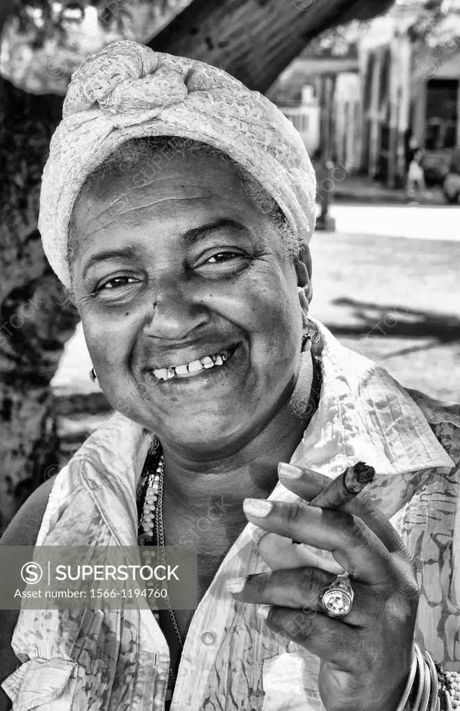 Woman Santeria religion in white tarot card reader in Regla area of Havana Cuba