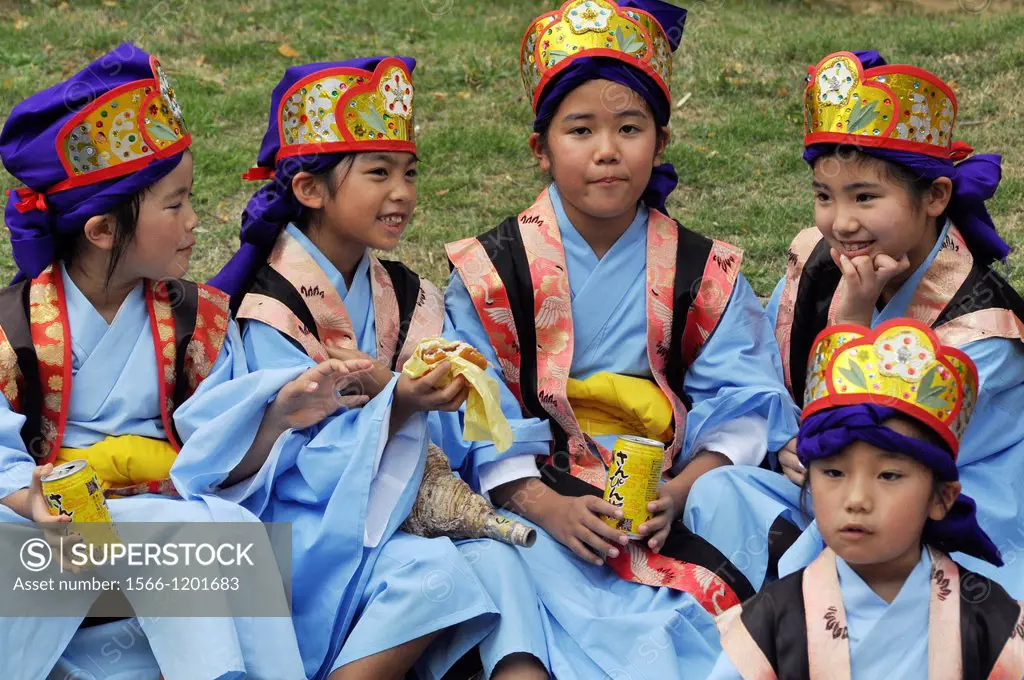 Naha, Okinawa, Japan, children in traditional Okinawan outfit during the Naha Festival October      