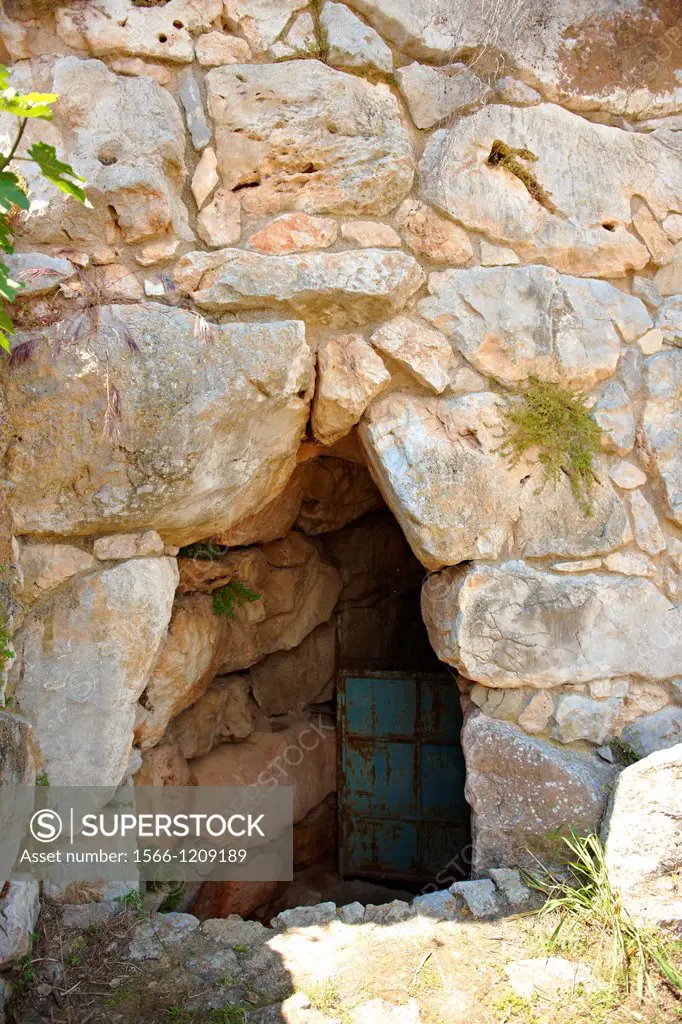 Ancient corbel arch gate in the walls of Tiryns        or        Mycenaean city archaeological site, Peloponnesos, Greece  A UNESCO World Heritage Sit...