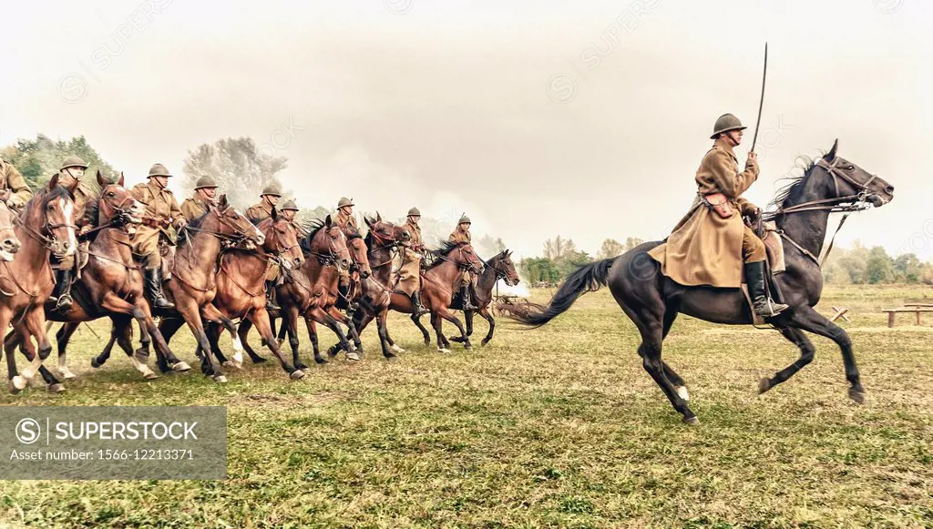 Polish cavalrymen ride their horses during WWII Battle of Lomianki - historical reenactment, Poland