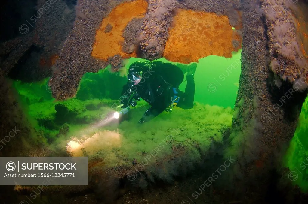 Diver at the shipwreck of the German transport vessel ""Salzburg"", In this transport ship died in 2300 of Soviet prisoners of war. Black Sea, Ukraine...