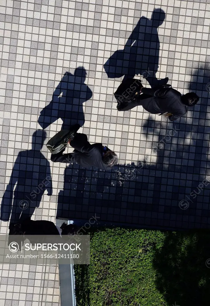 Chuo, Chuo-ku, Central Ward, Chuo City, heart of Tokyo with biggest concentration of businesses and offices, here men in black suits with briefcases g...