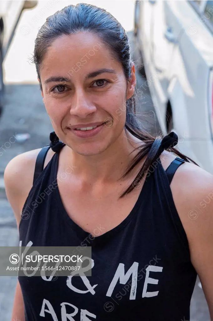 Sofia, Bulgaria. Bulgarian female volunteer in refugee camp Voenna Rampa, aiding the refugees from Syria.