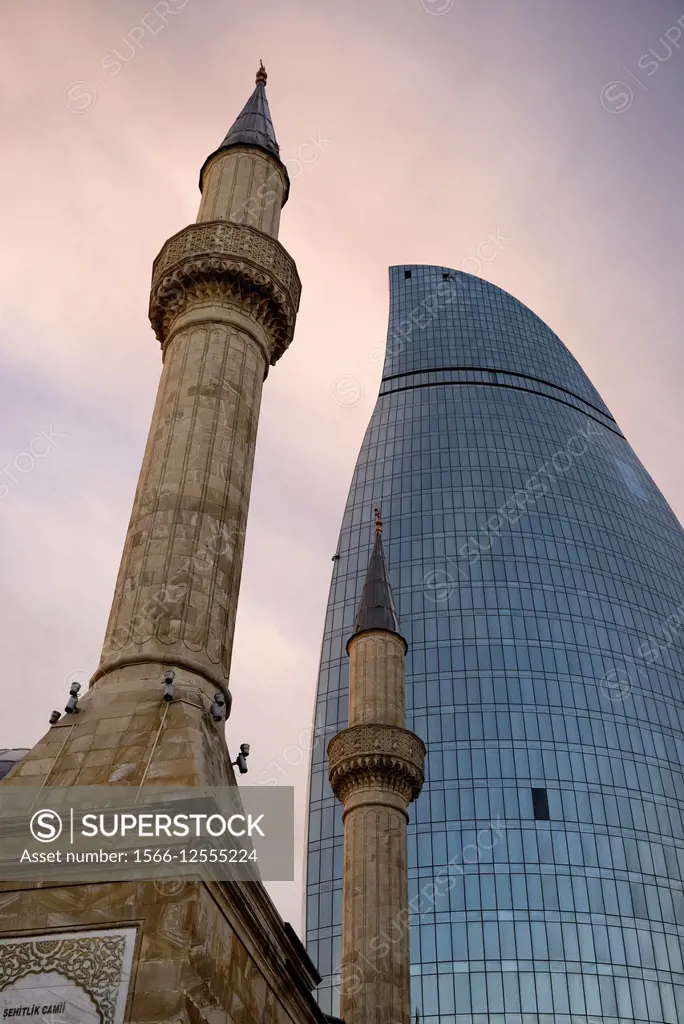 Azerbaijan, Baku, Martyrs´ Lane (Alley of Martyrs), small mosque and the Flame Towers.