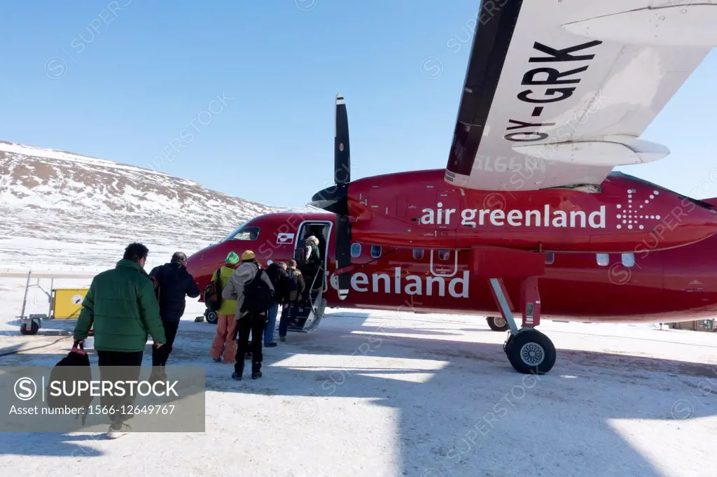 Boarding an Air Greenland Dash 8 at Qaanaaq airport Thule