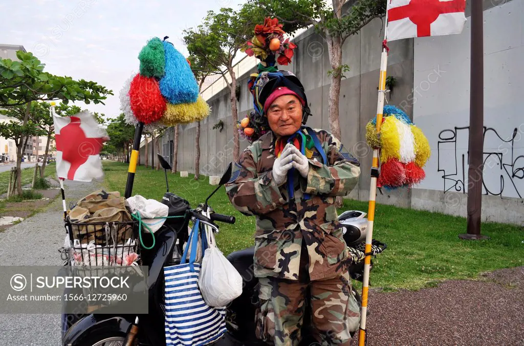 Naha, Okinawa, Japan: ´Ohayo Oji-chan´, a popular character of the city. He wishes ´Ohayo gozaimasu´ ´Good morning´ to all the pedestrians he meets