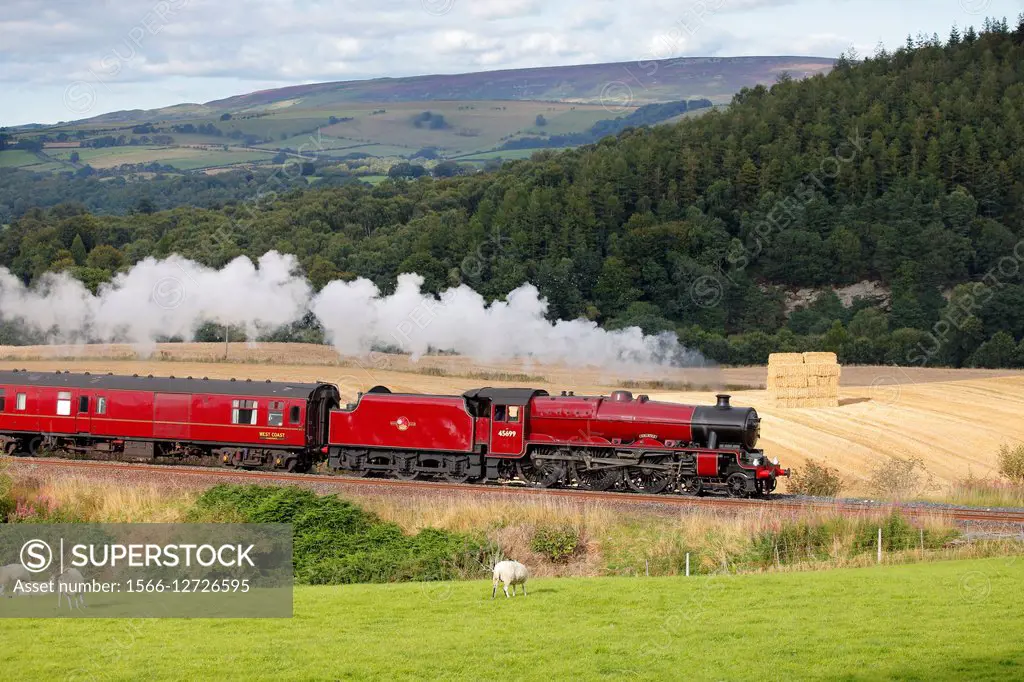 Steam locomotive LMS Jubilee Class 45699 Galatea near Low Baron Wood Farm, Armathwaite ,Eden Valley, Cumbria, England, UK.