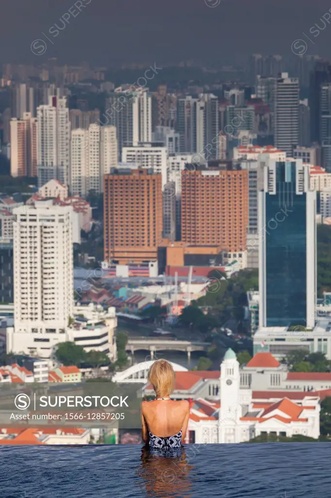 Singapore, Marina Bay Sands Hotel, rooftop swimming pool, dawn.