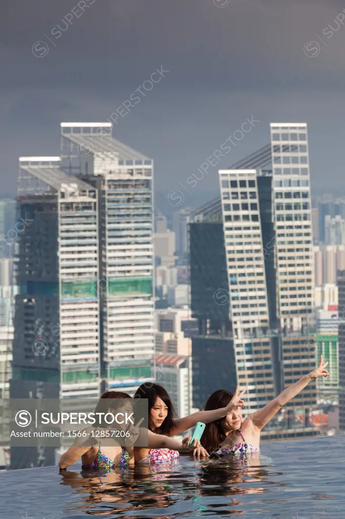 Singapore, Marina Bay Sands Hotel, rooftop swimming pool, dawn.