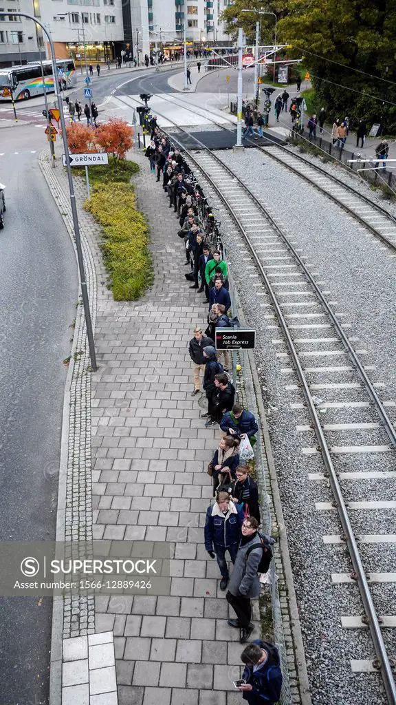 STOCKHOLM, SWEDEN Commuter bus stop for Scania truck employees, Liljeholmen, to take them to Scania headquarters in Södertälje, 35 kilometers away, ev...