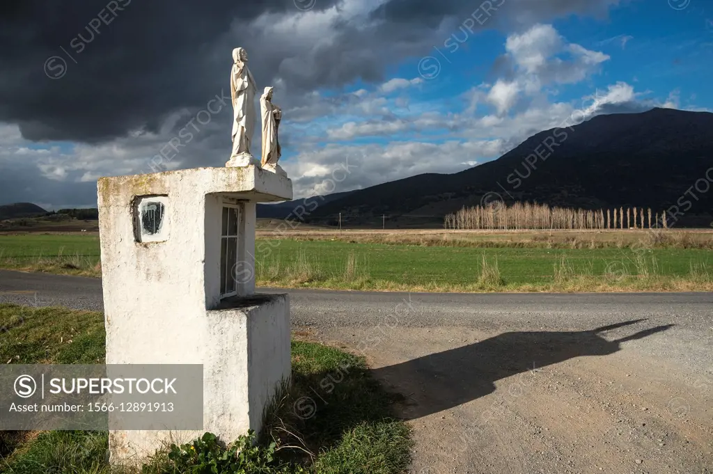 Roadside shrine on the plain of Mantineia, near Tripoli, Southern Arcadia, Peloponnese, Greece.