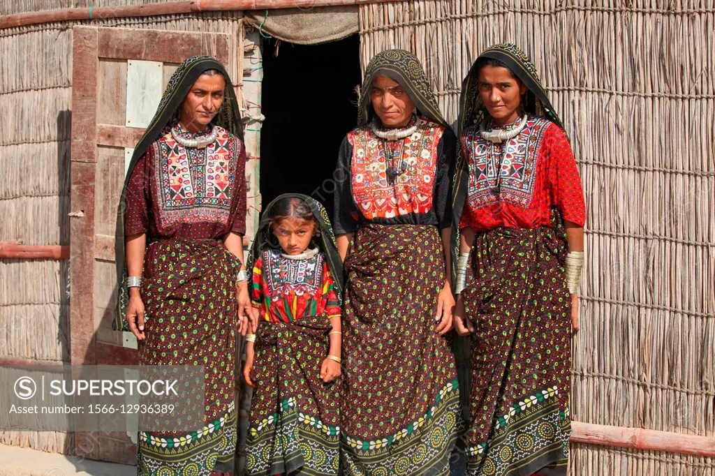 Fakirani Jat tribe, Medi Village, Women group in front of house ( Bunga), Kutch District, Gujarat, India.