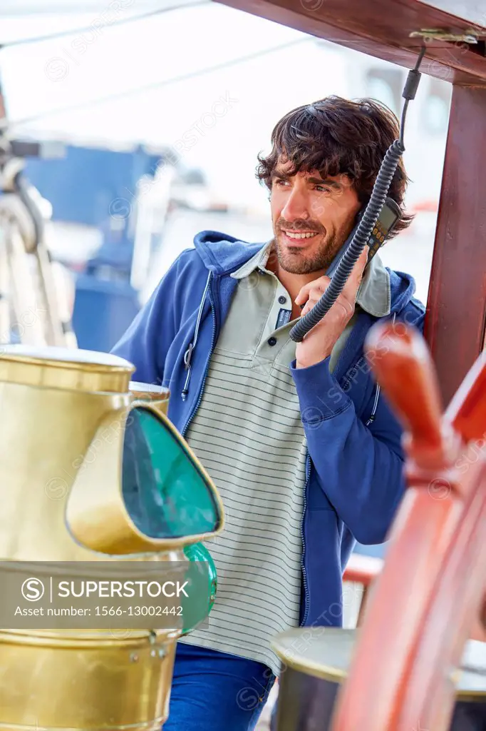 Sailor at the helm of a sailboat, galleon. Basque Country. Spain