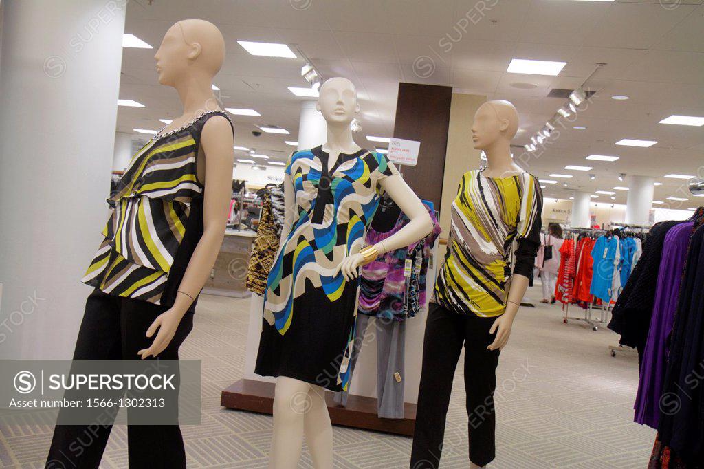 Hallandale Florida Miami,The Village at Gulfstream Park shopping,sign clearance  sale 75% women's clothing dress fashion Stock Photo - Alamy