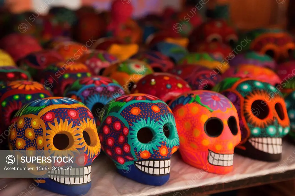 Colorful skulls in the souvenir shop at Tulum town, Tulum, Quintana Roo, Yucatan Province, Mexico, Central America