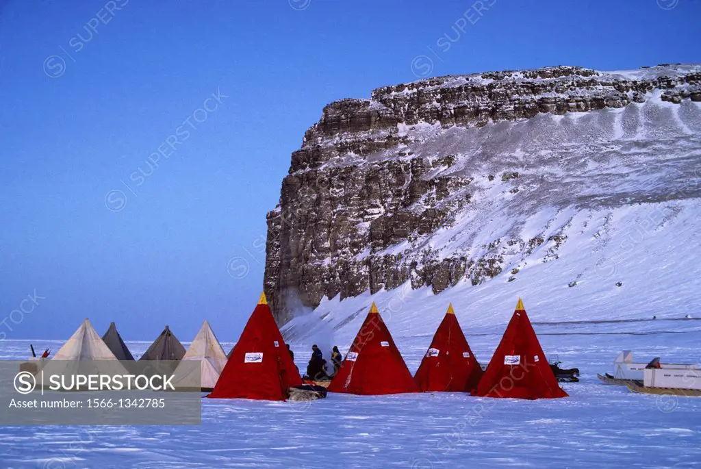 CANADA NUNAVUT FROZEN BARROW STRAIT ICE CAMP WITH BEECHY ISLAND