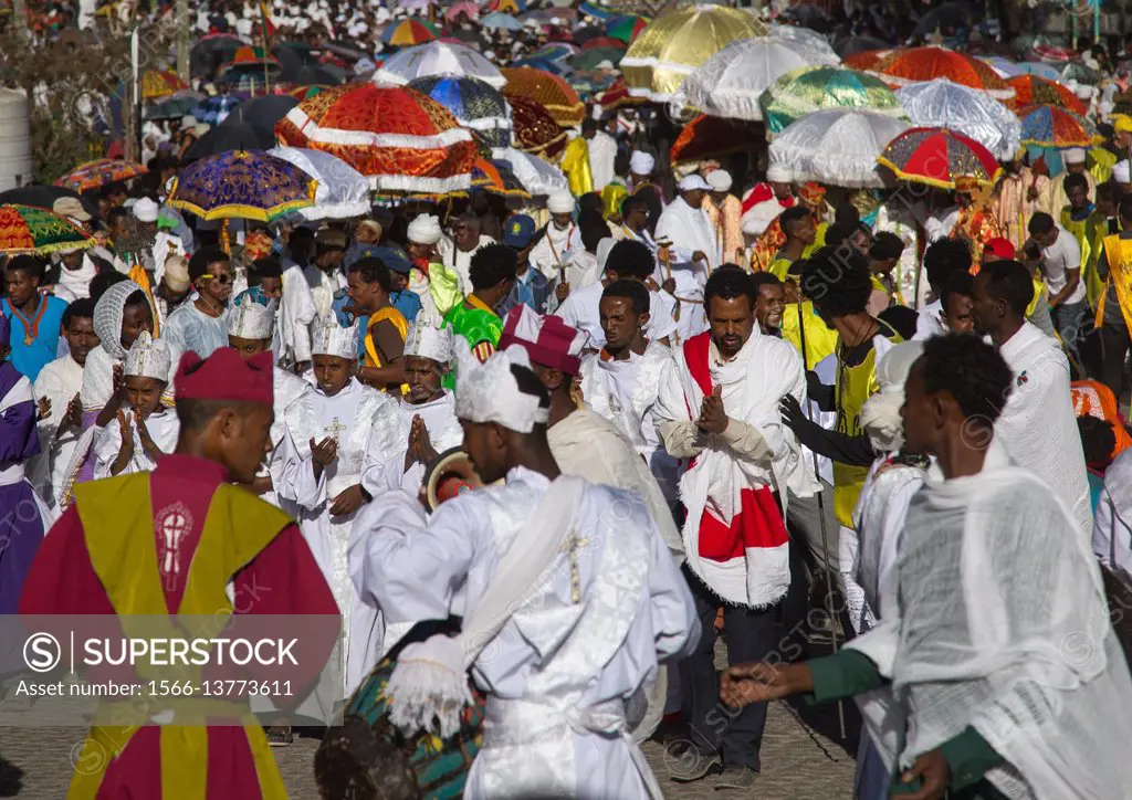 Ethiopian orthodox priests procession celebrating the colorful Timkat epiphany festival, Amhara region, Lalibela, Ethiopia.