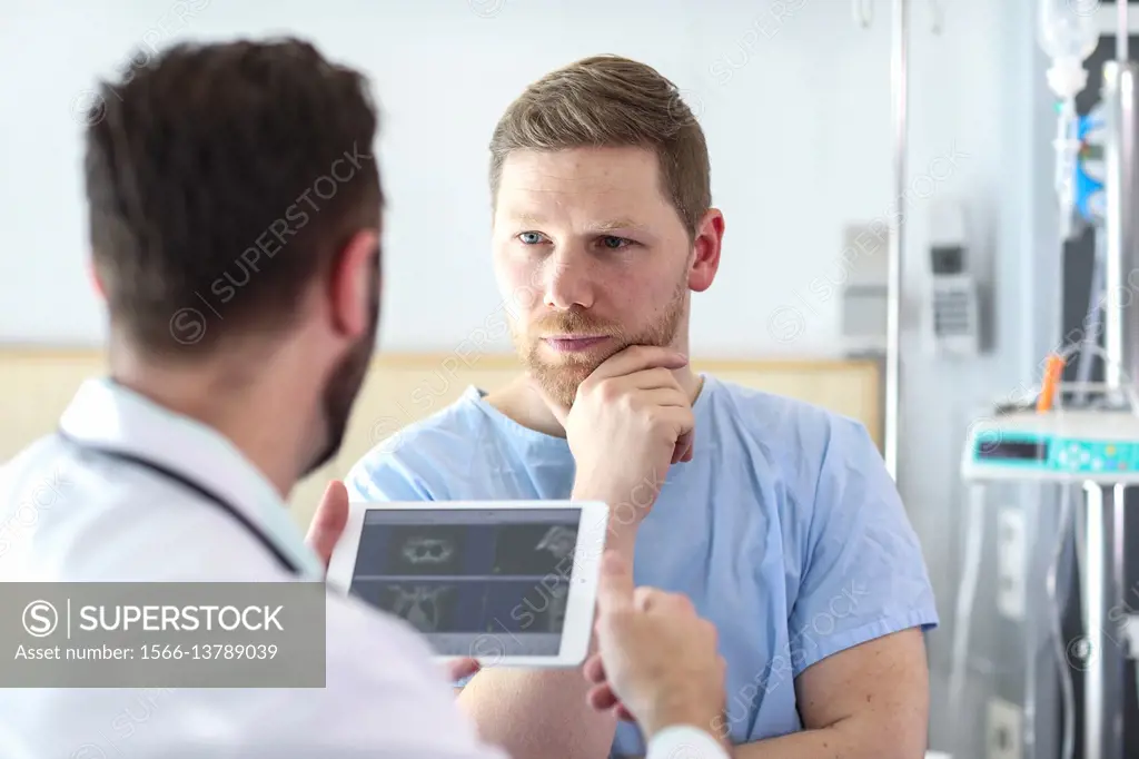 Patient in hospital room attended by a doctor, Tablet, Hospital