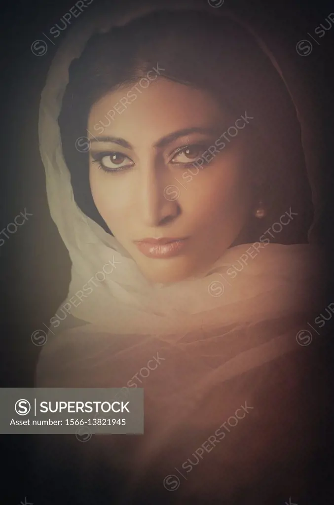 Veiled middle eastern woman.