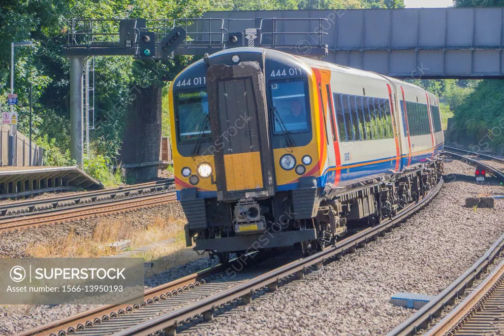 Class 444 EMU Desiro Electric Train of South West Trains passes throuh Farnborouh Station Hampshire on 5th July 2017.