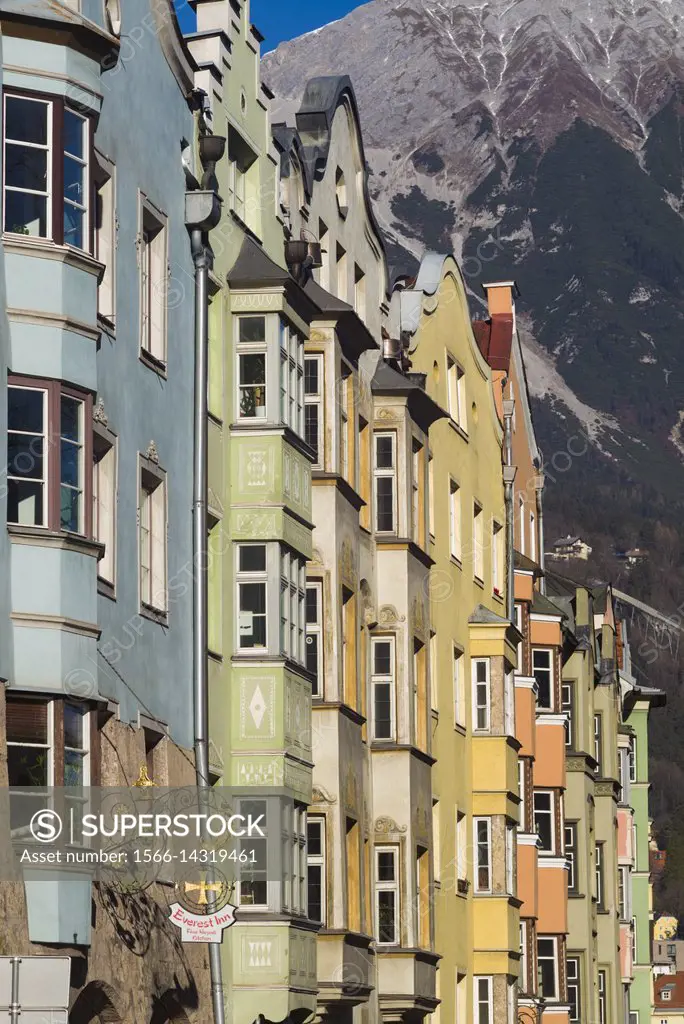 Austria, Tyrol, Innsbruck, buildings along the Inn River riverfront.