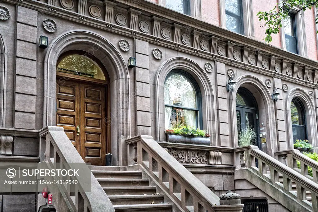 New York City Manhattan, Upper West Side. Looking Up at the Entrances to Two Brownstone Townhouses, With Distinctively Upper West Side Architecture.