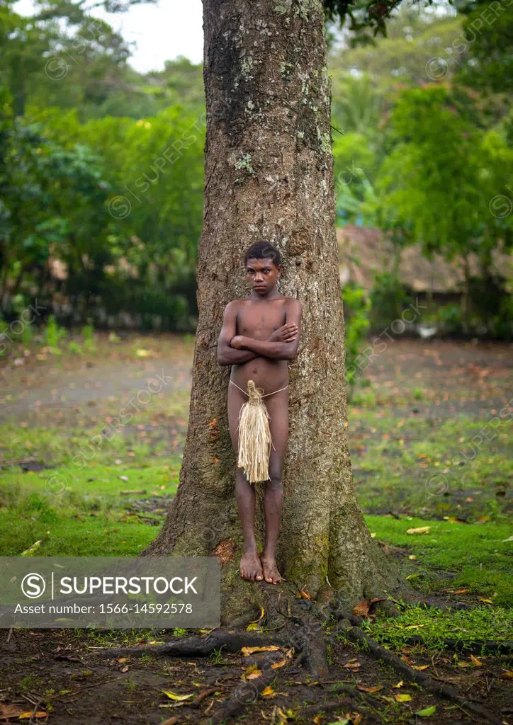 Teenage boy wearing a penis sheath called a namba, Tanna island, Yakel, Vanuatu.