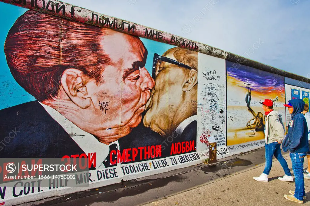 Fraternal kiss between Leonid Brezhnev and Erich Honecker, painting by Dmitri Vrubel Vladimirovich, Berlin Wall, East Side Gallery, Berlin, Germany, E...