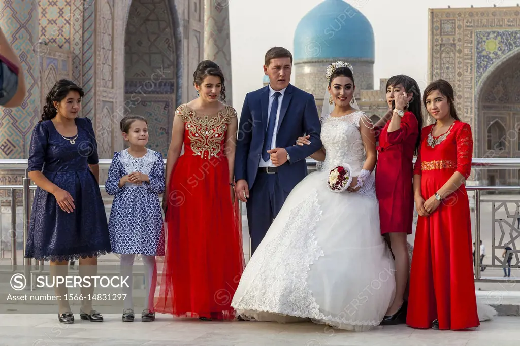 A . . Just Married. . Young Couple Pose For Wedding Photos At The