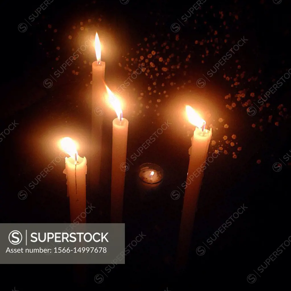 Candles during Day of the Dead celebrations in the cemetery of San Gregorio Atlapulco, Xochimilco, Mexico City, Mexico