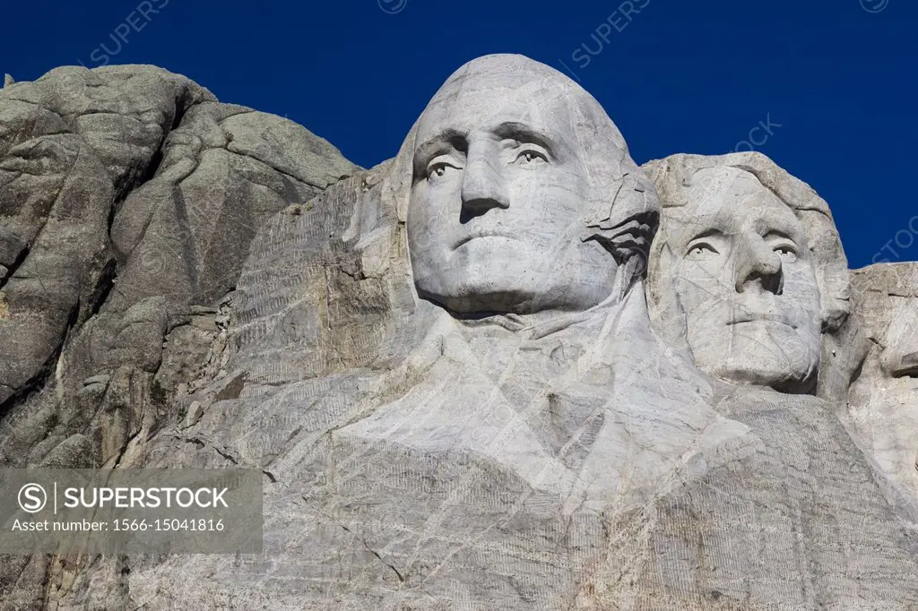 Sculpted faces of Presidents George Washington and Thomas Jefferson. Mount Rushmore National Memorial, Black Hills, Keystone, South Dakota, U. S. A. ,...