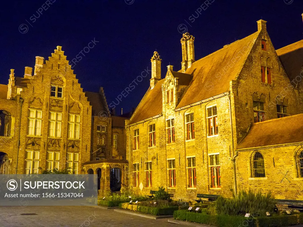 The historic buildings of the former hospital Saint John's Hospital (Site Oud Sint-Jan) by night - Bruges, Belgium.